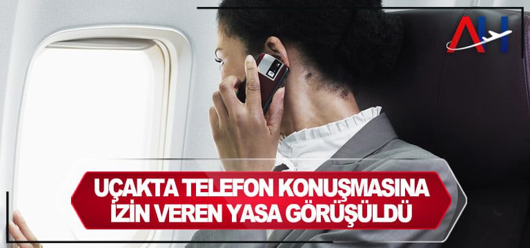 uçakta-telefonla-konusma