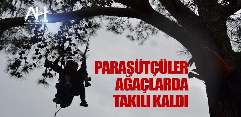 Paraşütçüler-ağaçlarda-takılı-kaldı